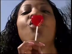 Ebony hussy sucks a sweetmeat outdoors and takes a ride on a BBC